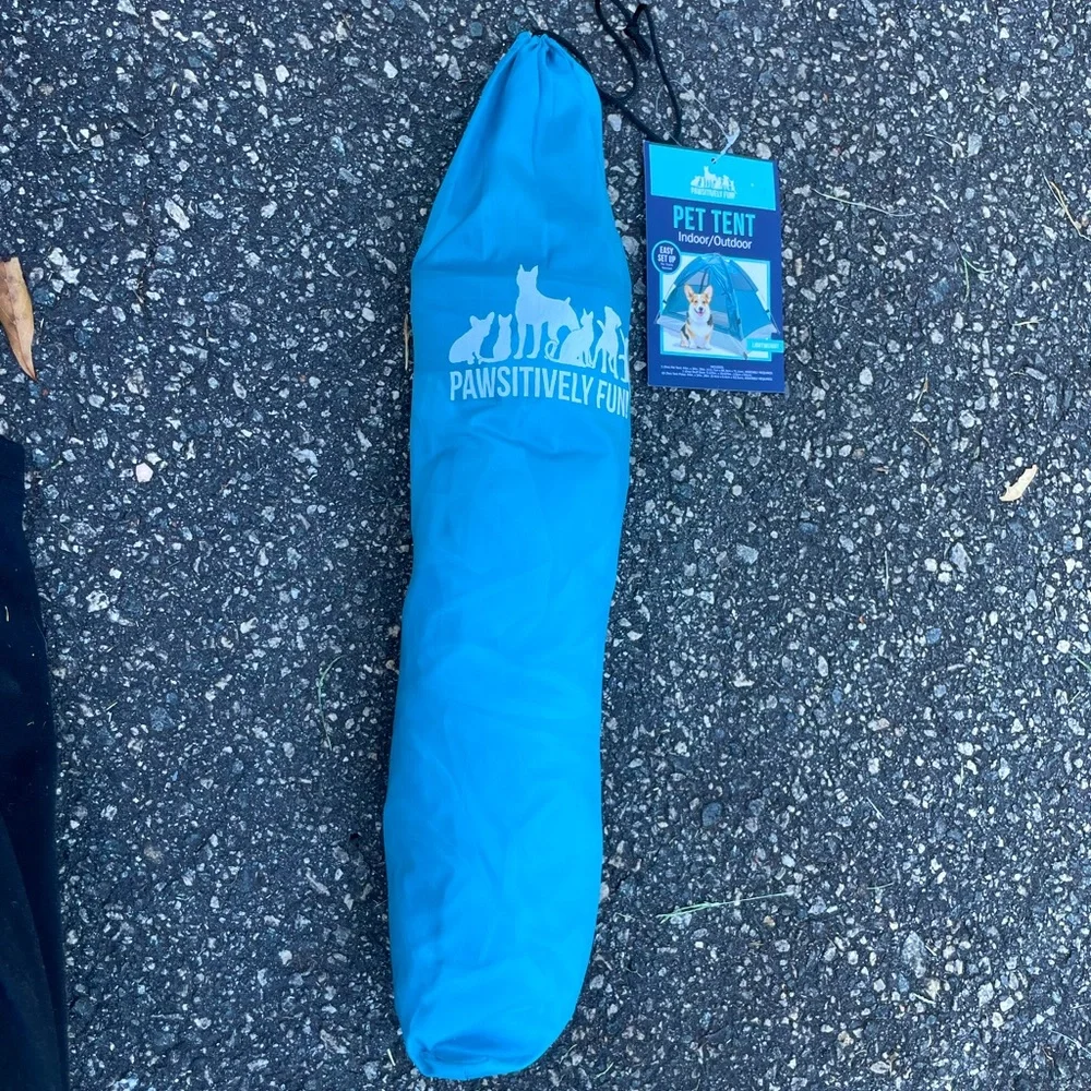 Here is a blue and gray pet tent. It’s very big and nice for an animal.